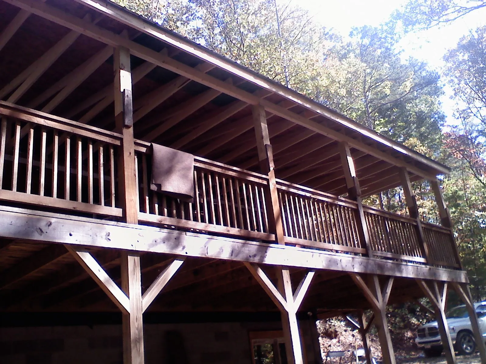 Timber framing under a new elevated porch and deck — Roof Leak Repair in San Marcos by Roofing Brothers